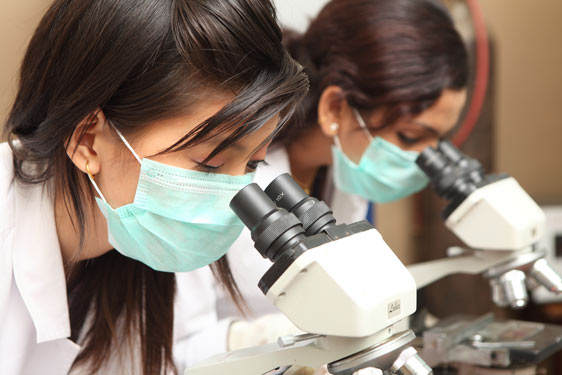 Alpha arts chennai Bio-tech students using the College laboratory