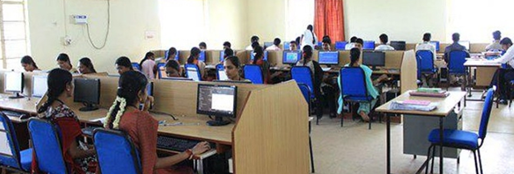 Alpha students using lab equipments in college bio Computer Science laboratory