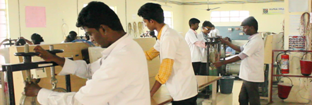 Alpha students using lab equipments in college Electricals Machines laboratory