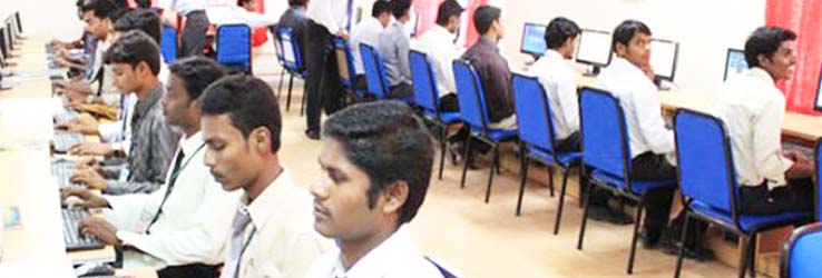 Alpha MBA students studying at the computer lab