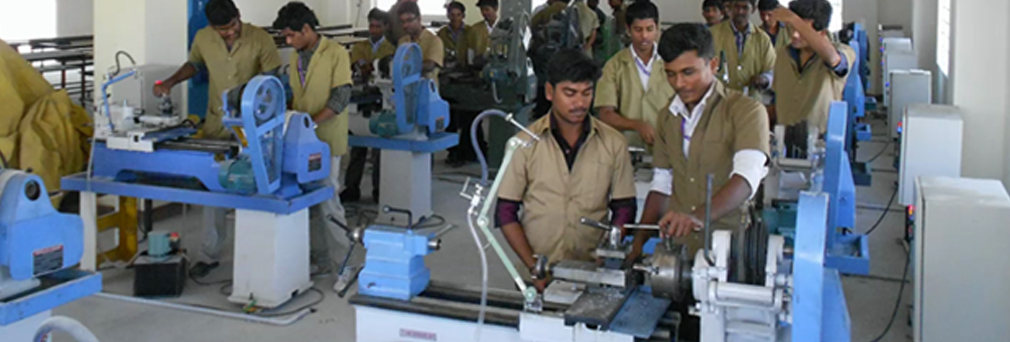 Alpha students using lab equipments in college mechanical laboratory